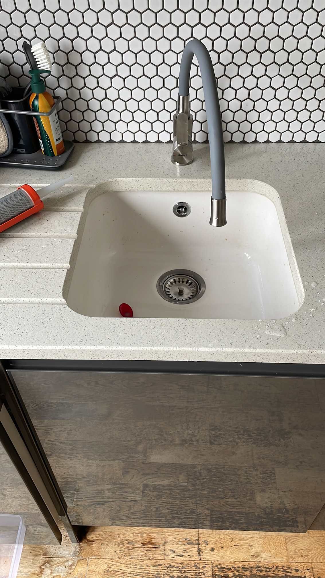 Kitchen sink and tap